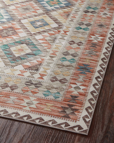 Dressed in refined ivory and vibrant multi-toned hues, the Zion ZIO-04 Ivory / Multi Area Rug is a power-loomed 100% polyester area rug that completes any room