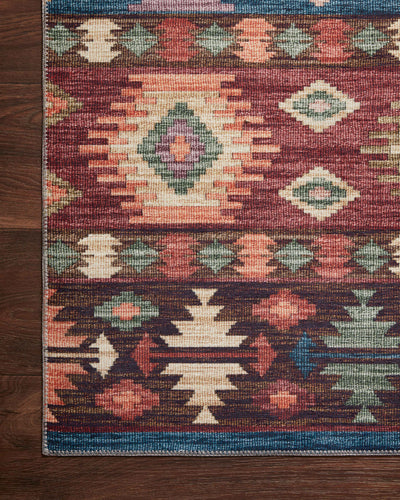 A power-loomed 100% polyester area rug in lively fiesta and vibrant multi-toned tones, the Zion ZIO-06 Fiesta / Multi Area Rug grounds your room beautifully