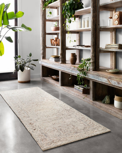The Ziva ZV-01 Neutral Area Rug is a hand-tufted 100% wool area rug that radiates neutral charm and contemporary and linear elegance