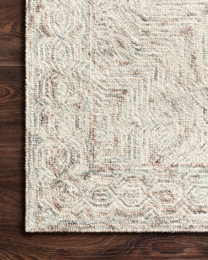 The Ziva ZV-01 Neutral Area Rug is a hand-tufted 100% wool area rug that radiates neutral charm and contemporary and linear elegance