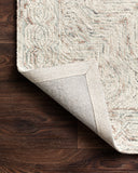The Ziva ZV-01 Neutral Area Rug is a hand-tufted 100% wool area rug that radiates neutral charm and contemporary and linear elegance