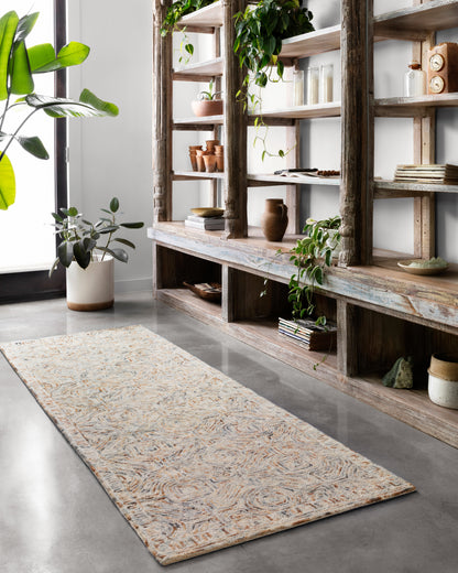 Layered in vibrant multi-toned hues with contemporary and linear patterns, the Ziva ZV-02 Multi Area Rug is a hand-tufted 100% wool area rug perfect for any setting