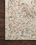 Layered in vibrant multi-toned hues with contemporary and linear patterns, the Ziva ZV-02 Multi Area Rug is a hand-tufted 100% wool area rug perfect for any setting