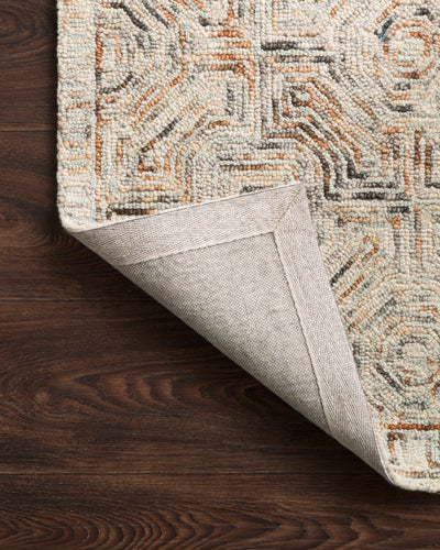 Layered in vibrant multi-toned hues with contemporary and linear patterns, the Ziva ZV-02 Multi Area Rug is a hand-tufted 100% wool area rug perfect for any setting