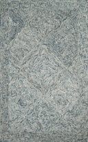 Featuring casual denim hues and contemporary and linear detail, the Ziva ZV-04 Denim Area Rug is a hand-tufted 100% wool area rug for any room