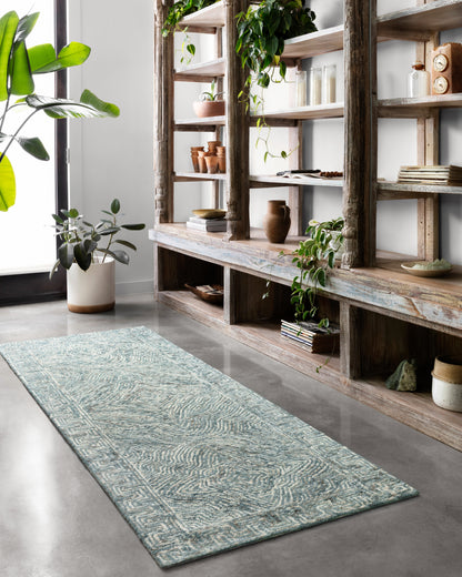 Featuring casual denim hues and contemporary and linear detail, the Ziva ZV-04 Denim Area Rug is a hand-tufted 100% wool area rug for any room