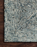 Featuring casual denim hues and contemporary and linear detail, the Ziva ZV-04 Denim Area Rug is a hand-tufted 100% wool area rug for any room