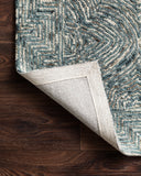 Featuring casual denim hues and contemporary and linear detail, the Ziva ZV-04 Denim Area Rug is a hand-tufted 100% wool area rug for any room