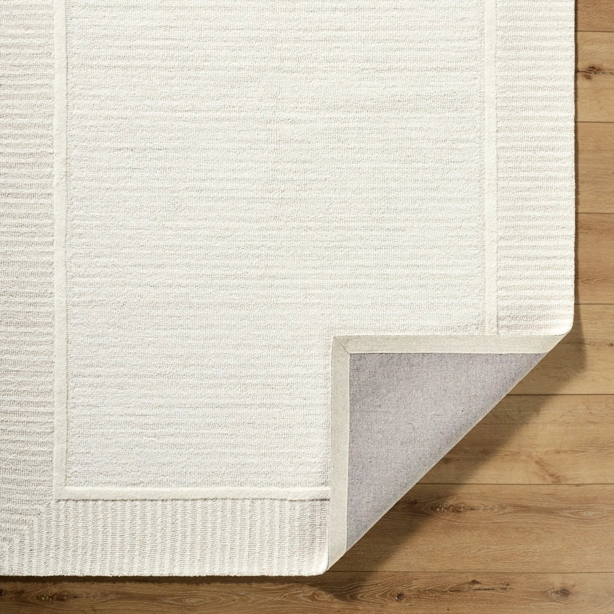 Benchcraft BEC-2306 Ivory Area Rug by LIVABLISS