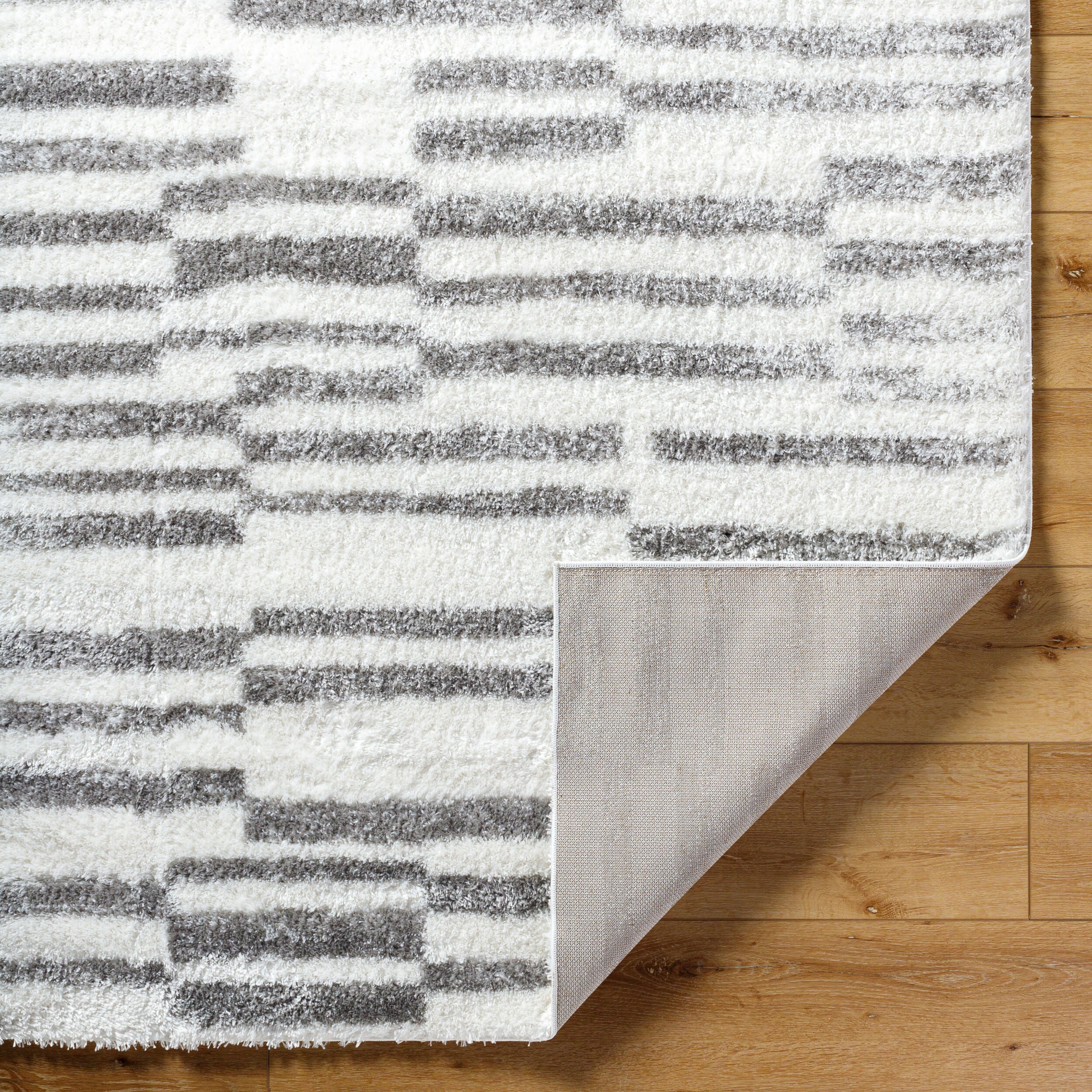 Surya Cloudy Shag CDG-2328 Off-White Area Rug by LIVABLISS