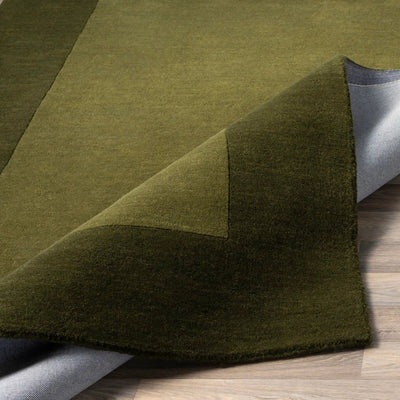 Livabliss Mystique M-315 Olive wool area rug featuring dynamic high and low pile texture, traditional hand-loomed construction, and a modern solid design.