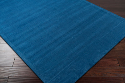 Livabliss Mystique M-330 Dark blue hand-loomed wool area rug with high-pile texture resting on two-tone hardwood flooring.