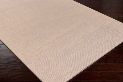 Livabliss Mystique M-335 Tan hand-loomed wool area rug with textured pile on dark hardwood floor, ideal for modern interiors.