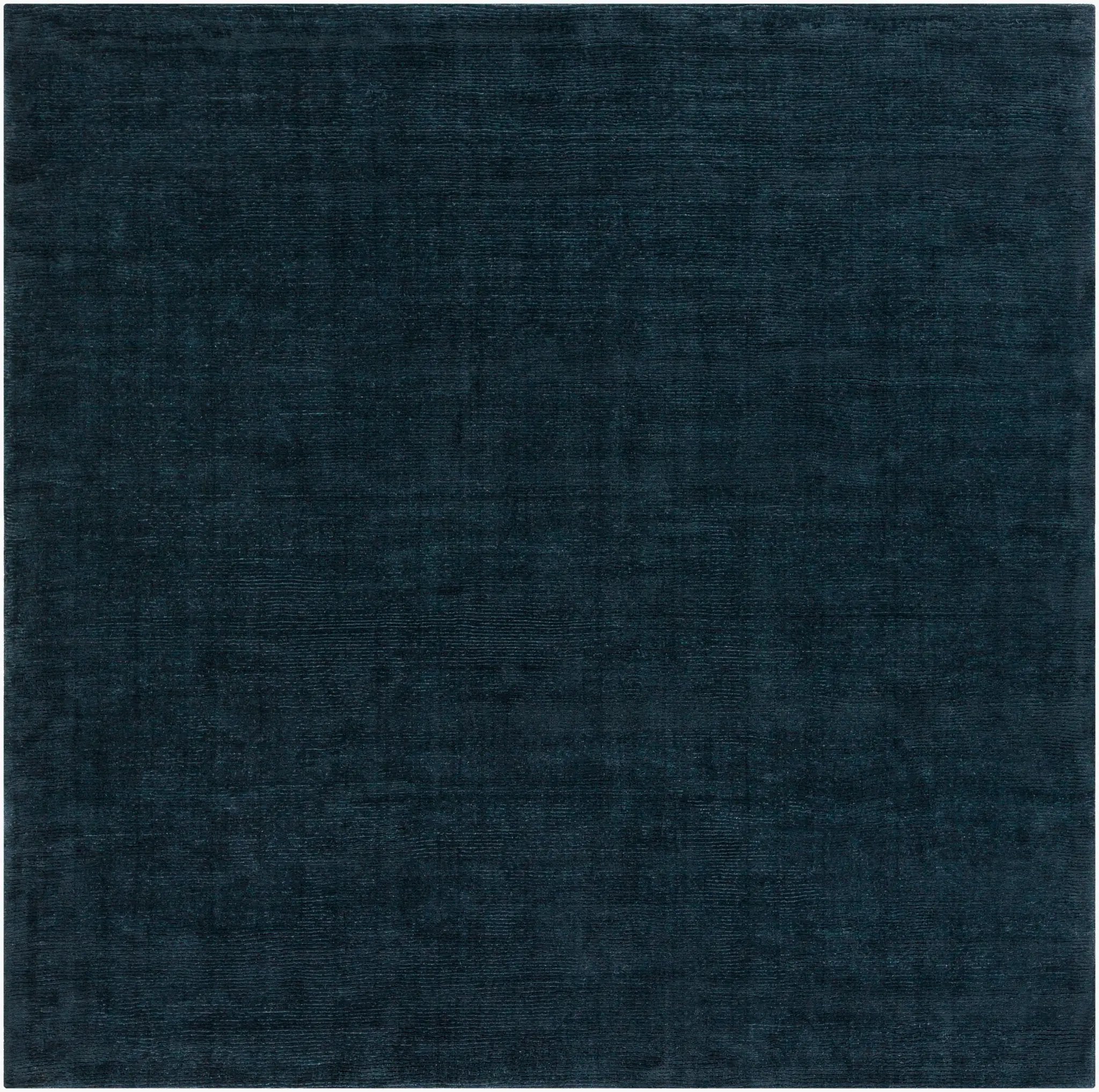 Livabliss Mystique M-340 Dark blue high-low pile wool area rug with hand-loomed texture for contemporary living rooms and offices.