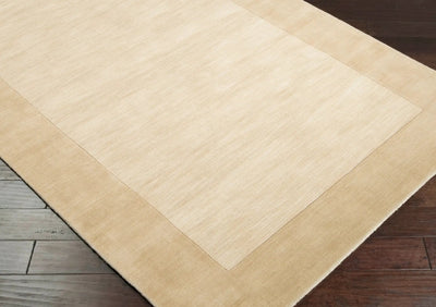 Livabliss Mystique M-344 Beige area rug with hand-loomed wool texture and contrasting border, ideal for modern minimalist living spaces.