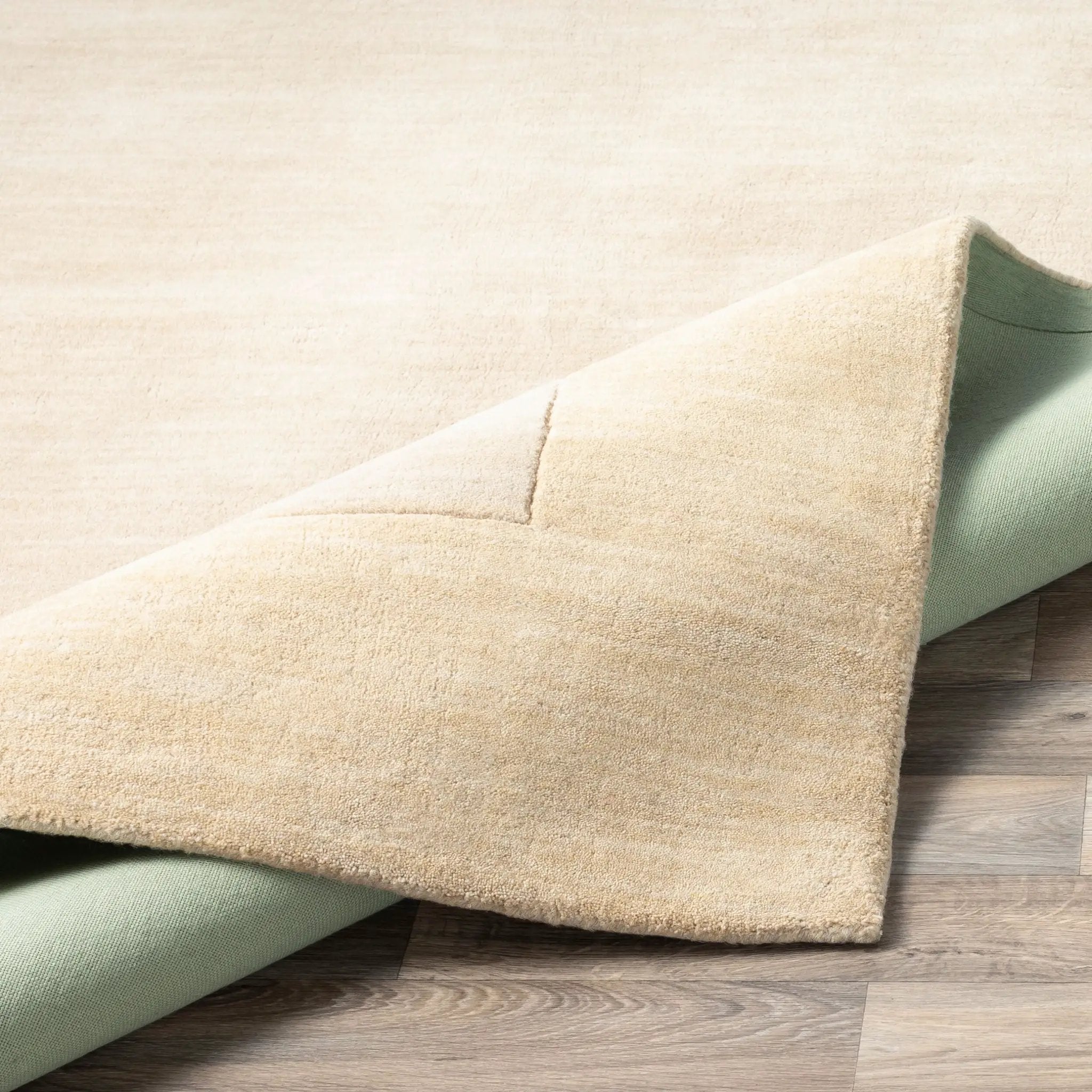 Livabliss Mystique M-344 Beige hand-loomed wool area rug with dynamic high-low pile texture for contemporary interiors.