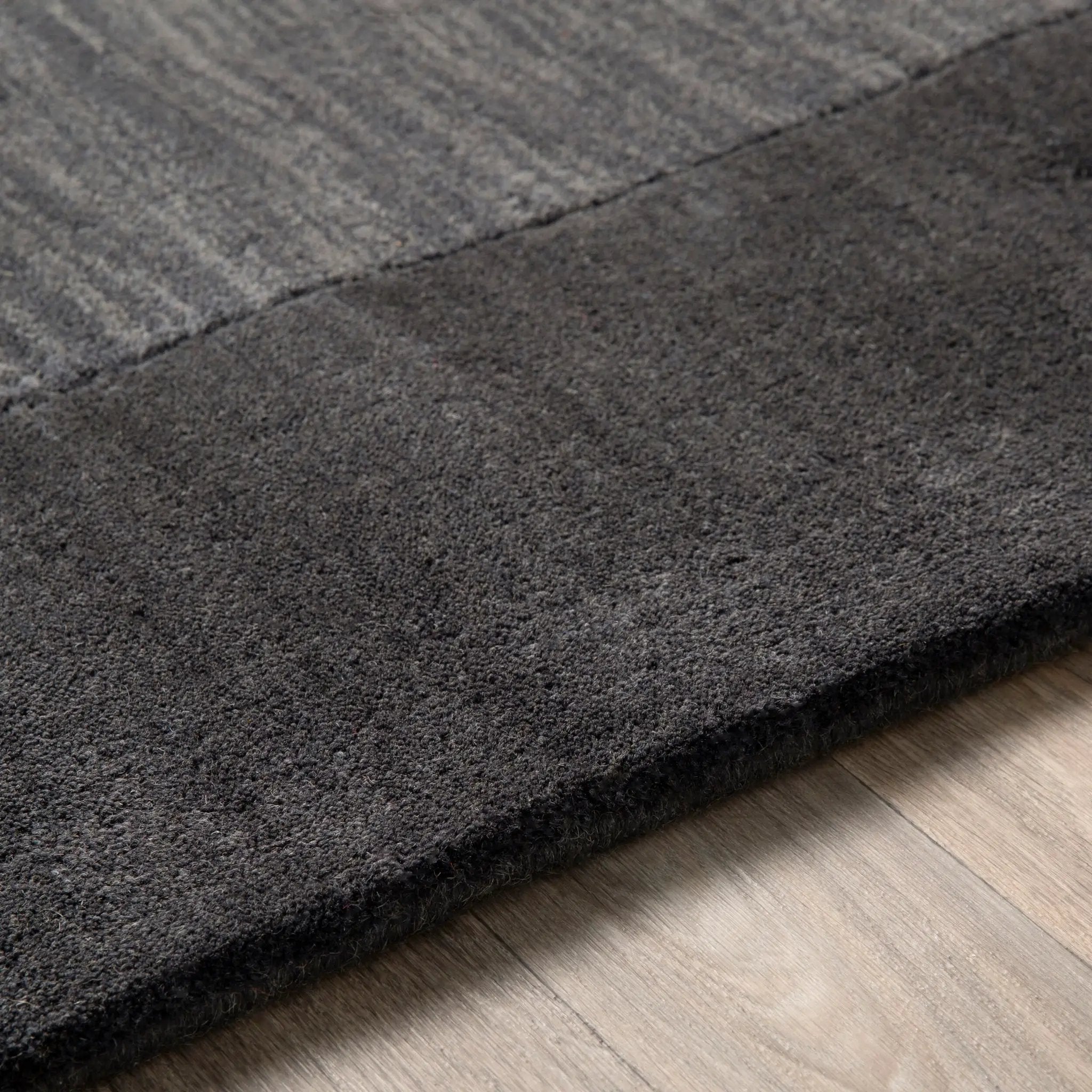 Livabliss Mystique M-347 Charcoal area rug with refined modern texture and durable comfort for contemporary living spaces and bedrooms.