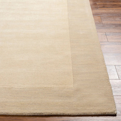 Livabliss Mystique M-348 Cream hand-loomed Indian wool area rug featuring a structured high-low pile profile and uniform border, laid over hardwood flooring.
