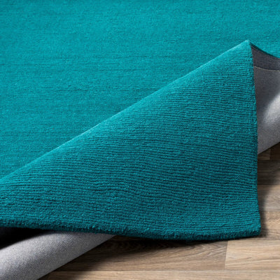 Livabliss Mystique M-5330 Deep teal hand-loomed wool area rug with contemporary high-low texture and durable grey backing.