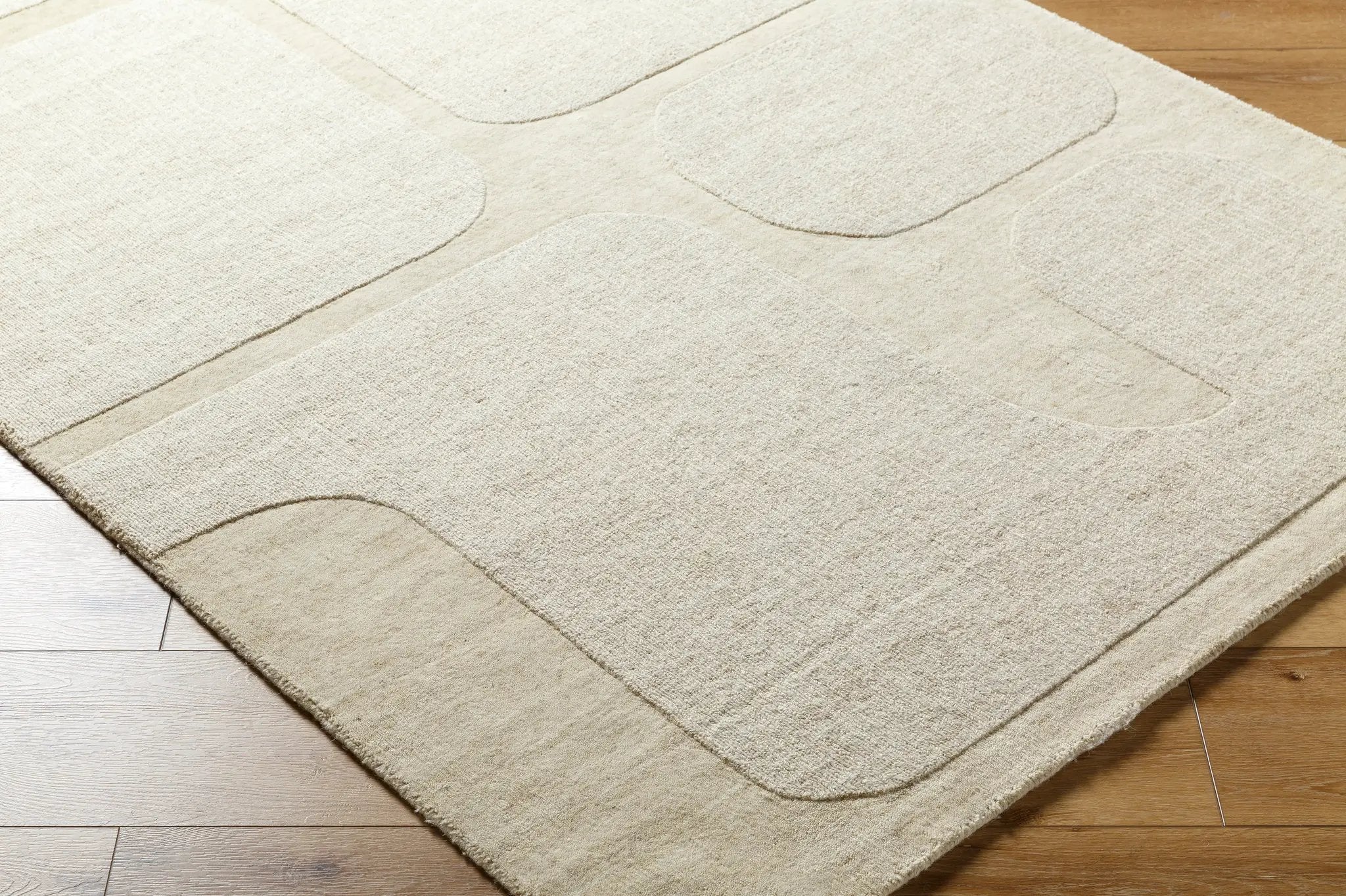 Livabliss Mystique M-5476 beige area rug featuring hand-loomed 100% wool with abstract organic shapes and durable medium pile texture.