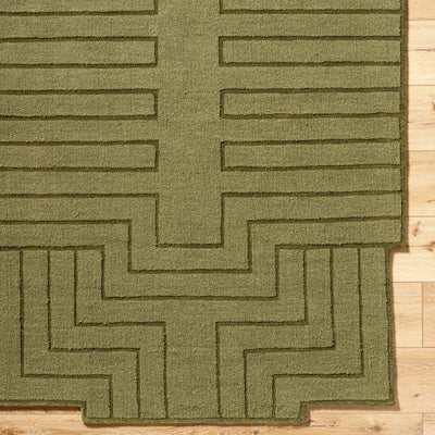 Livabliss Mystique M-5497 Olive green hand-loomed wool area rug with raised geometric maze pattern resting on light wood flooring.