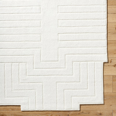 Livabliss Mystique M-5498 Ivory hand-loomed wool area rug featuring a textured geometric maze pattern and medium pile on hardwood flooring.