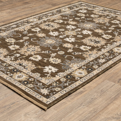 Acacia ACA01 Brown/Tan vintage-inspired area rug with rich brown and tan colors, classic pattern detail, wool nylon blend, and fringe.