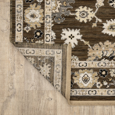 Acacia ACA01 Brown/Tan vintage-inspired area rug with rich brown and tan colors, classic pattern detail, wool nylon blend, and fringe.