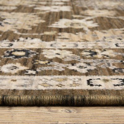 Acacia ACA01 Brown/Tan vintage-inspired area rug with rich brown and tan colors, classic pattern detail, wool nylon blend, and fringe.