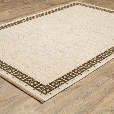Acacia ACA02 Beige/Brown neutral traditional area rug with layered beige and brown tones, muted accent colors, and cotton fringe.
