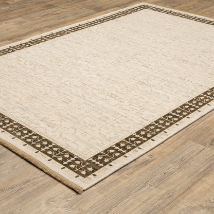 Acacia ACA02 Beige/Brown neutral traditional area rug with layered beige and brown tones, muted accent colors, and cotton fringe.