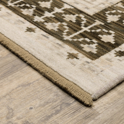 Acacia ACA02 Beige/Brown neutral traditional area rug with layered beige and brown tones, muted accent colors, and cotton fringe.