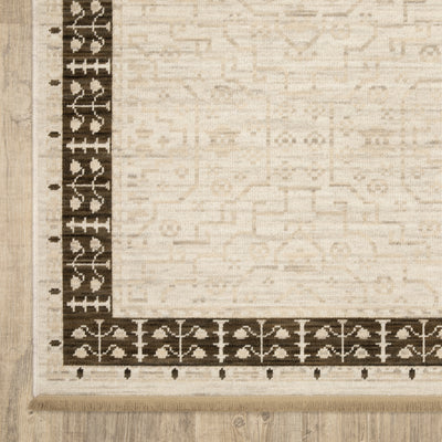 Acacia ACA02 Beige/Brown neutral traditional area rug with layered beige and brown tones, muted accent colors, and cotton fringe.
