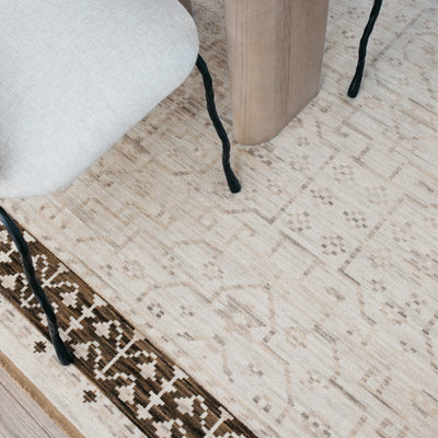 Acacia ACA02 Beige/Brown neutral traditional area rug with layered beige and brown tones, muted accent colors, and cotton fringe.