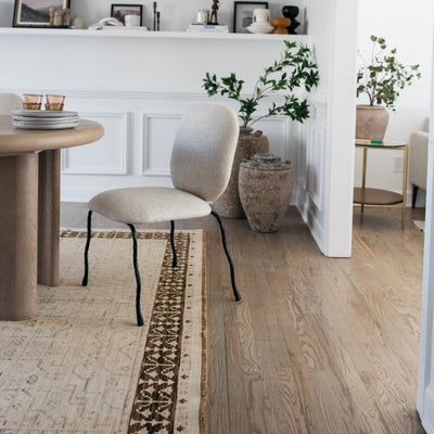 Acacia ACA02 Beige/Brown neutral traditional area rug with layered beige and brown tones, muted accent colors, and cotton fringe.