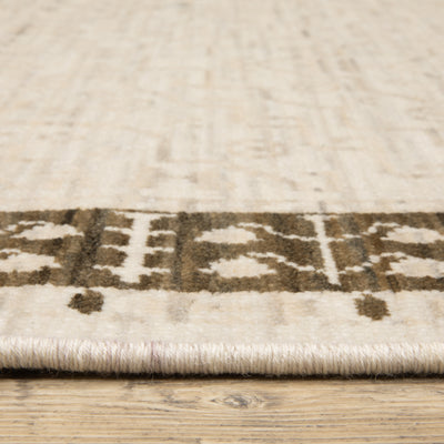 Acacia ACA02 Beige/Brown neutral traditional area rug with layered beige and brown tones, muted accent colors, and cotton fringe.
