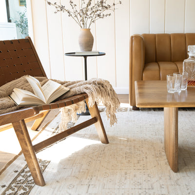 Acacia ACA02 Beige/Brown neutral traditional area rug with layered beige and brown tones, muted accent colors, and cotton fringe.