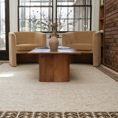 Acacia ACA02 Beige/Brown neutral traditional area rug with layered beige and brown tones, muted accent colors, and cotton fringe.