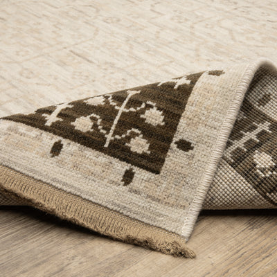 Acacia ACA02 Beige/Brown neutral traditional area rug with layered beige and brown tones, muted accent colors, and cotton fringe.