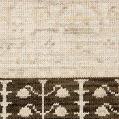 Acacia ACA02 Beige/Brown neutral traditional area rug with layered beige and brown tones, muted accent colors, and cotton fringe.