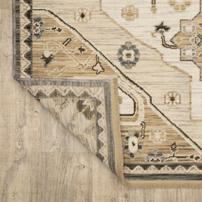 Acacia ACA03 Tan/Grey traditional area rug with earthy tan, grey, brown, gold, blue, clay, and green tones and cotton fringe.
