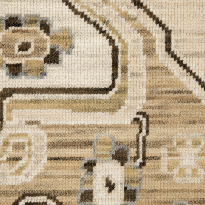 Acacia ACA03 Tan/Grey traditional area rug with earthy tan, grey, brown, gold, blue, clay, and green tones and cotton fringe.