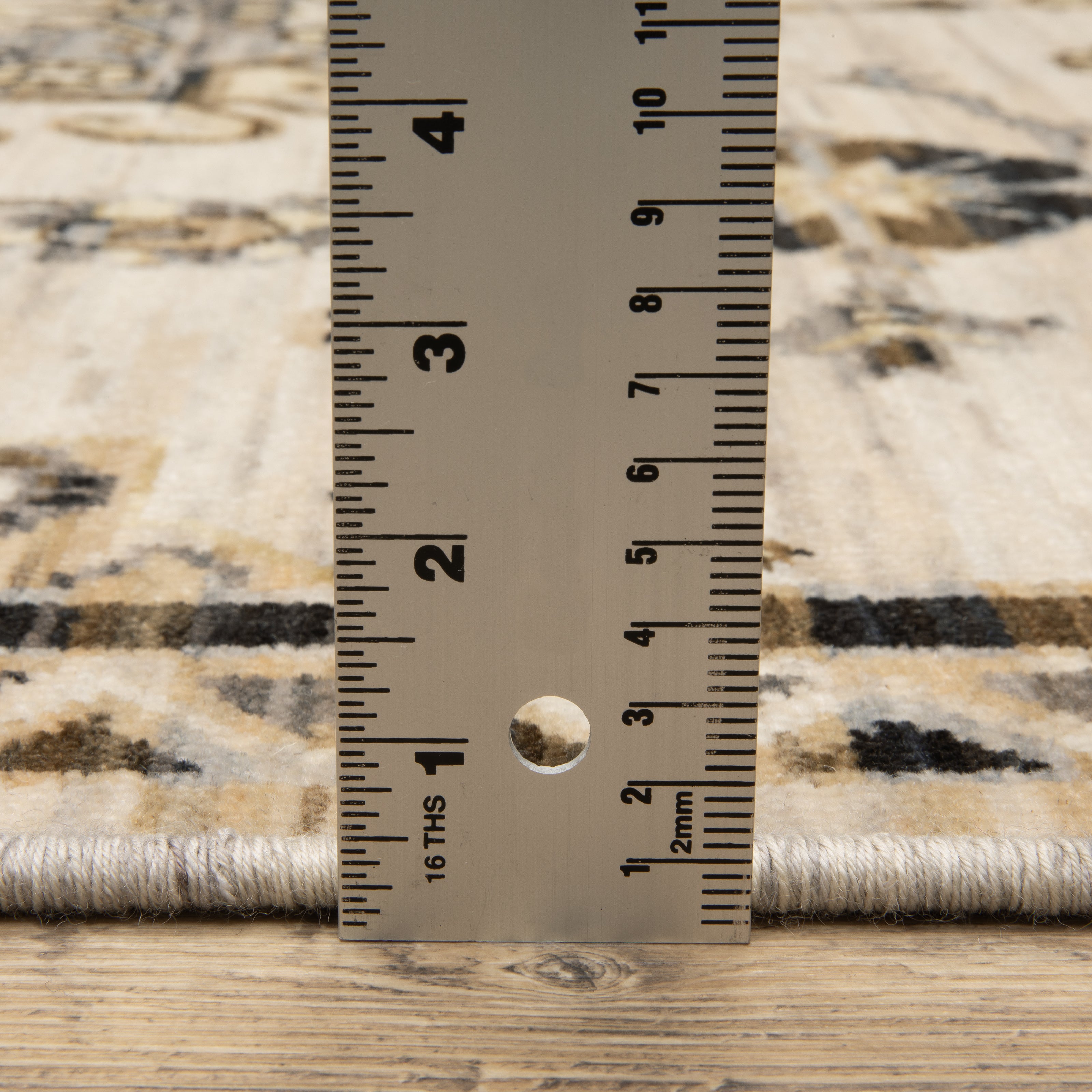 Acacia ACA04 Brown/Grey wool nylon area rug with classic pattern, saturated brown and grey tones, multicolor accents, and cotton fringe.