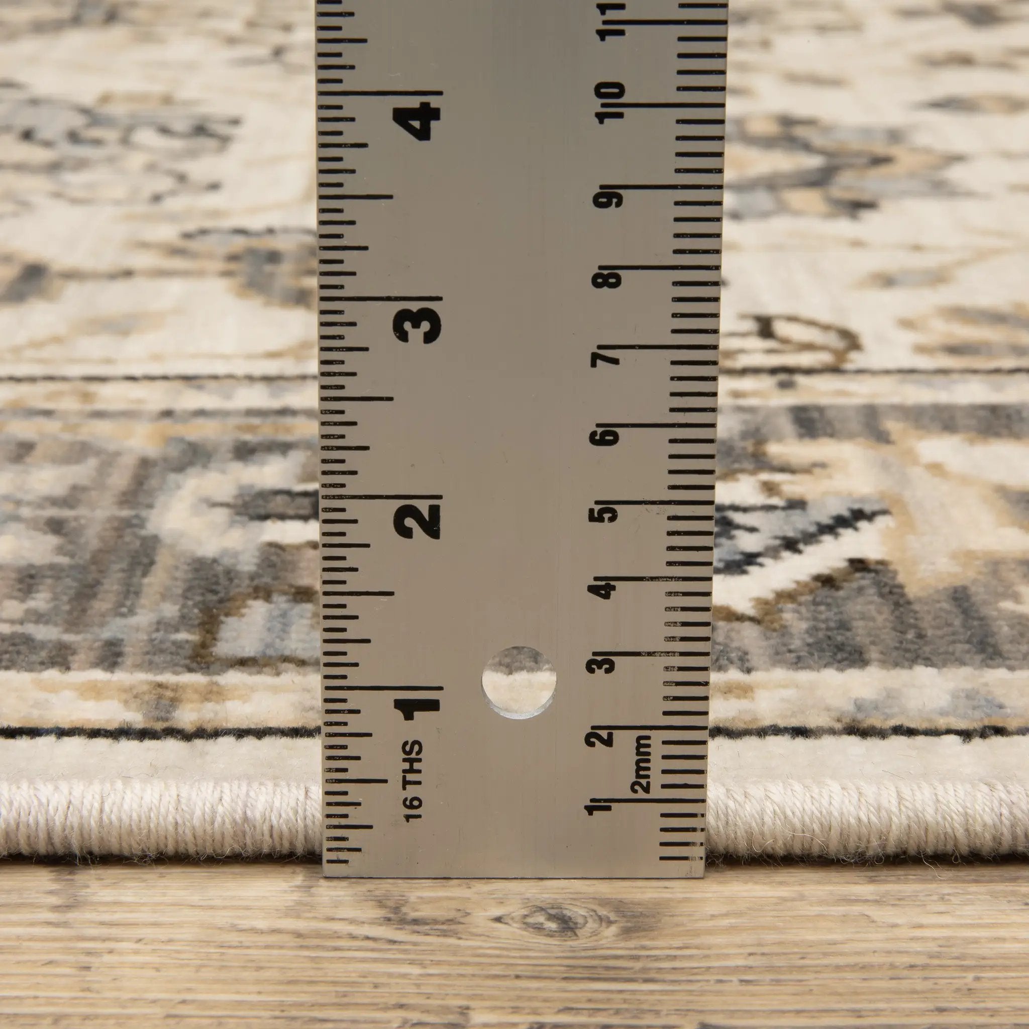 Acacia ACA06 Beige/Grey neutral area rug with traditional pattern, beige and grey tones, wool nylon texture, and cotton fringe.