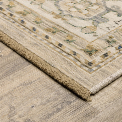 Acacia ACA07 Beige/Grey vintage-style area rug with soft neutral colors, traditional pattern detail, wool nylon texture, and cotton fringe.