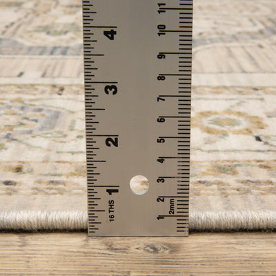 Acacia ACA07 Beige/Grey vintage-style area rug with soft neutral colors, traditional pattern detail, wool nylon texture, and cotton fringe.