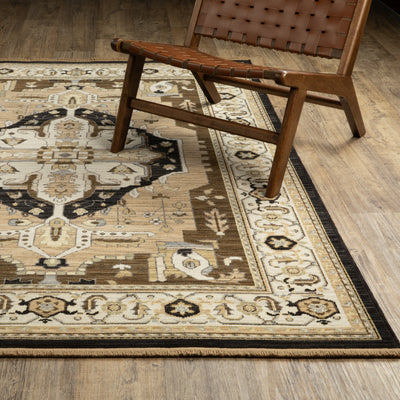 Acacia ACA08 Tan/Black traditional area rug with bold black contrast, warm tan ground, earthy accent colors, and incorporated cotton fringe.