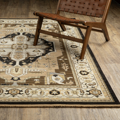 Acacia ACA08 Tan/Black traditional area rug with bold black contrast, warm tan ground, earthy accent colors, and incorporated cotton fringe.