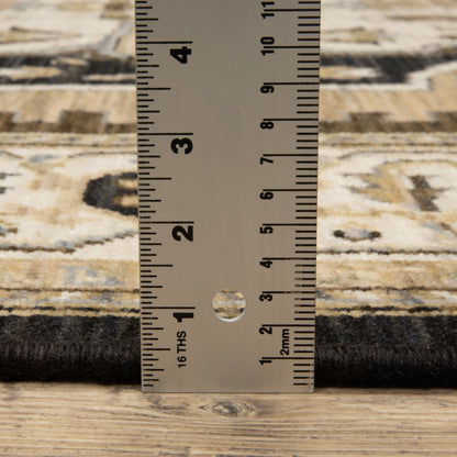 Acacia ACA08 Tan/Black traditional area rug with bold black contrast, warm tan ground, earthy accent colors, and incorporated cotton fringe.