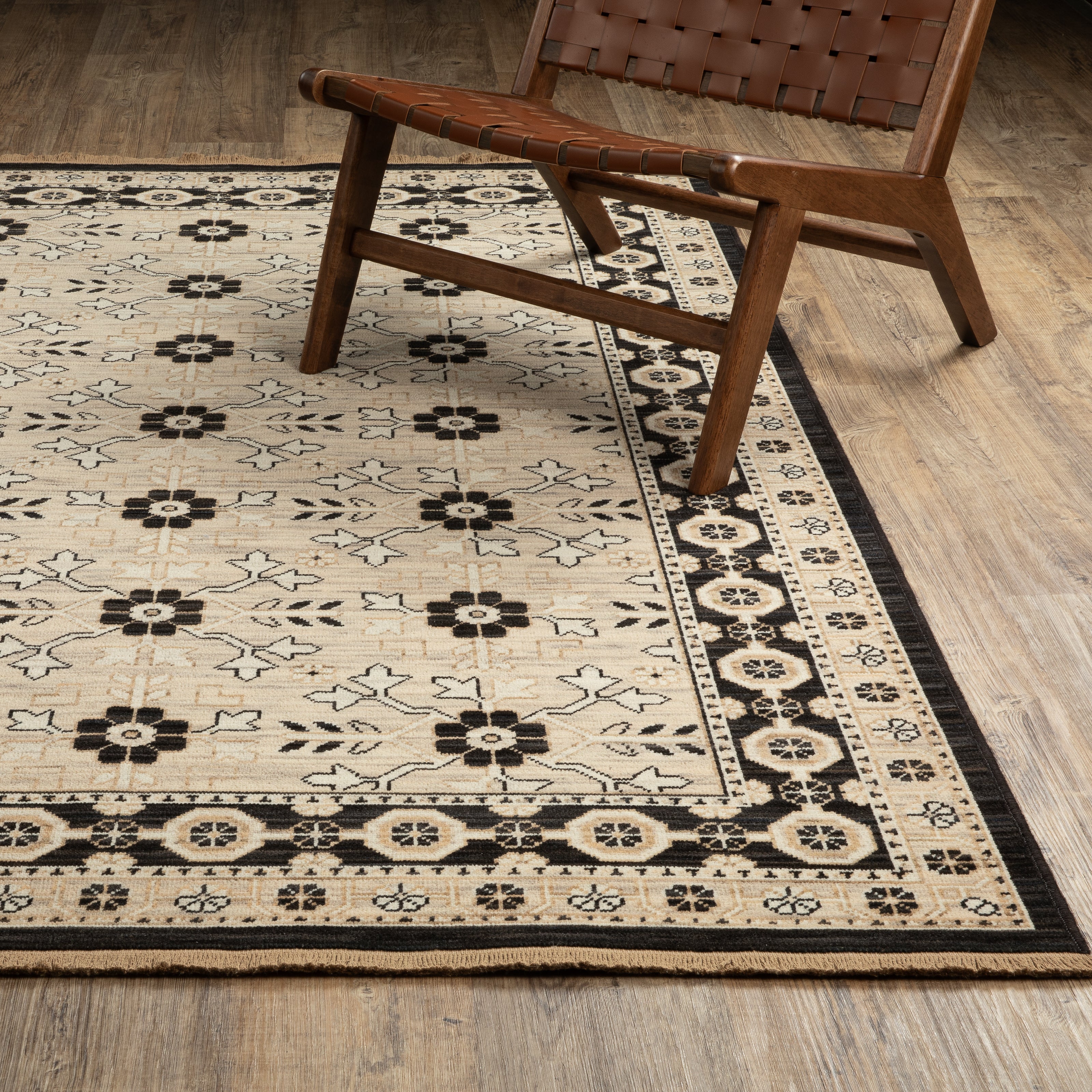 Acacia ACA09 Beige/Black statement area rug with classic pattern, beige and black contrast, earthy accent colors, and cotton fringe.